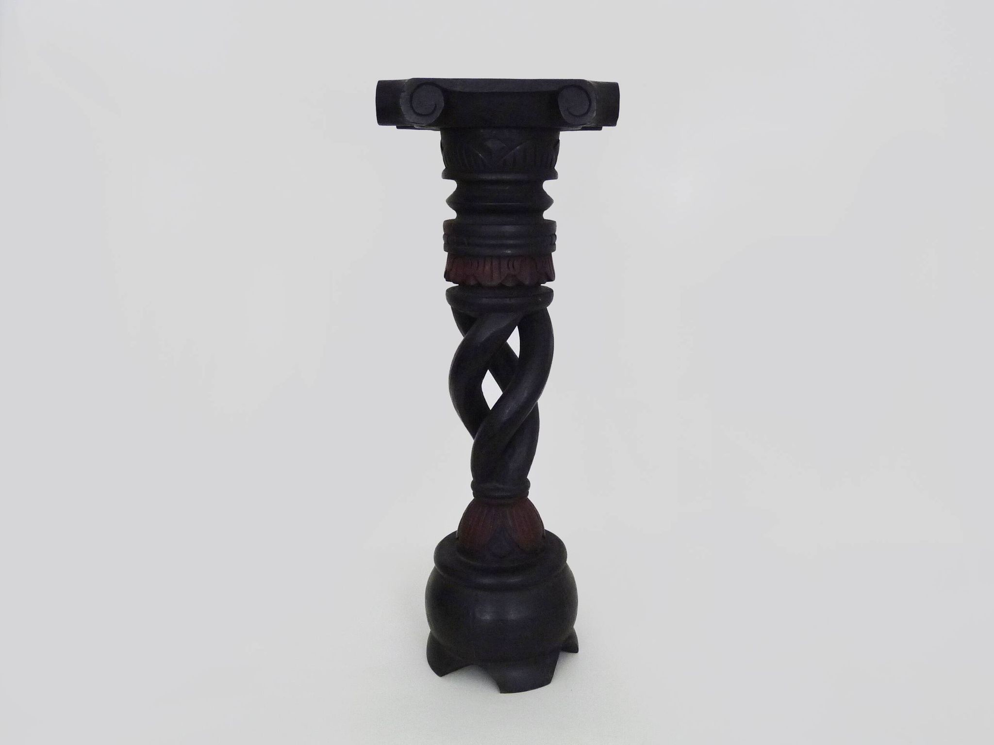 Twisted and engraved blackened wooden pedestal. 1960s 70s.