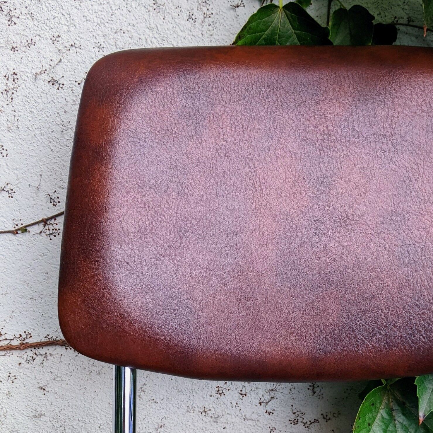 70s metal and imitation leather chairs