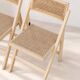 Paire de chaises pliantes en cannage et bois