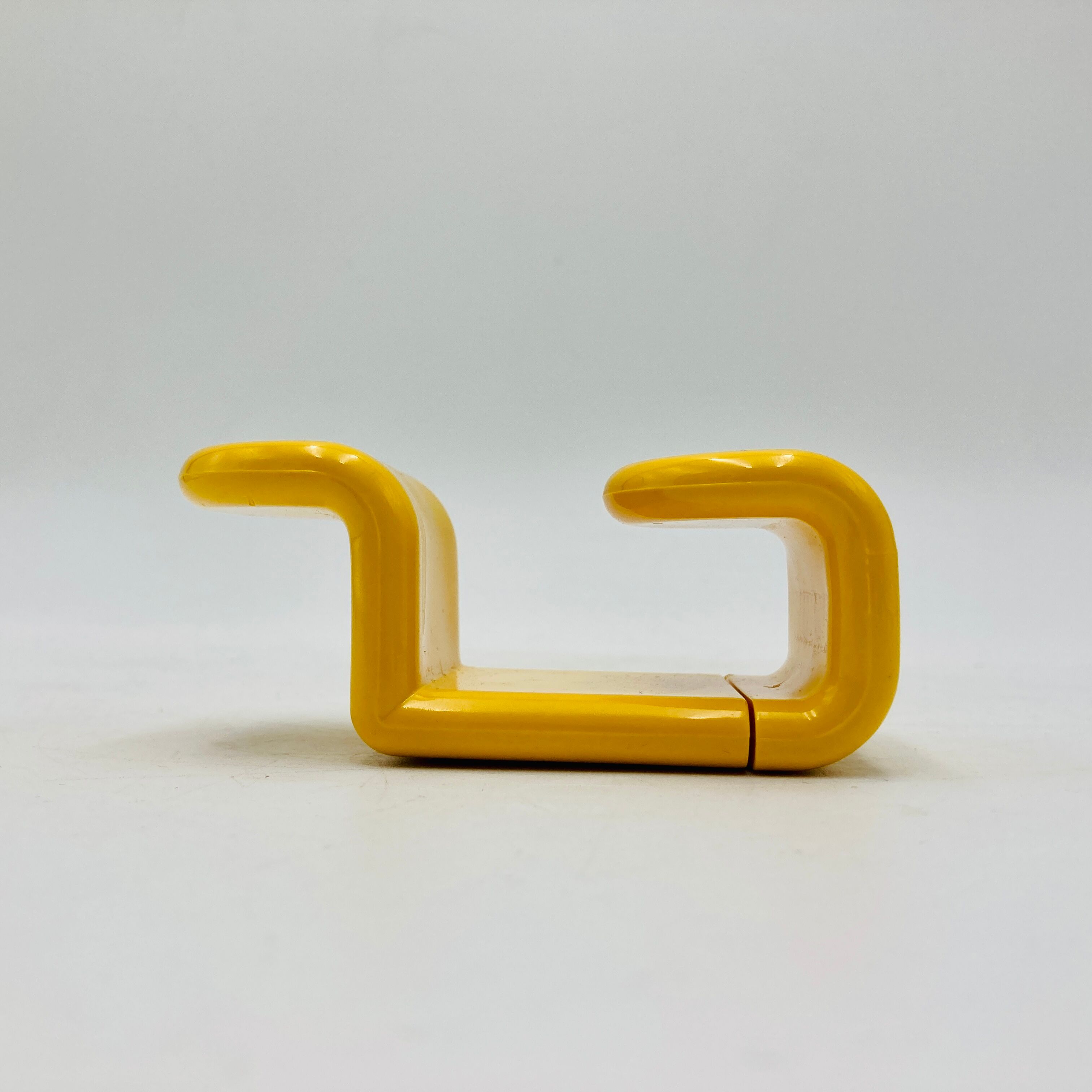 Yellow plastic hooks, design A. Rossari, Gedy edition.