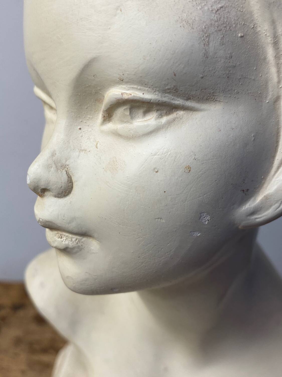 Plaster bust of a young girl