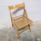 Chaise pliante à l'assise cannée