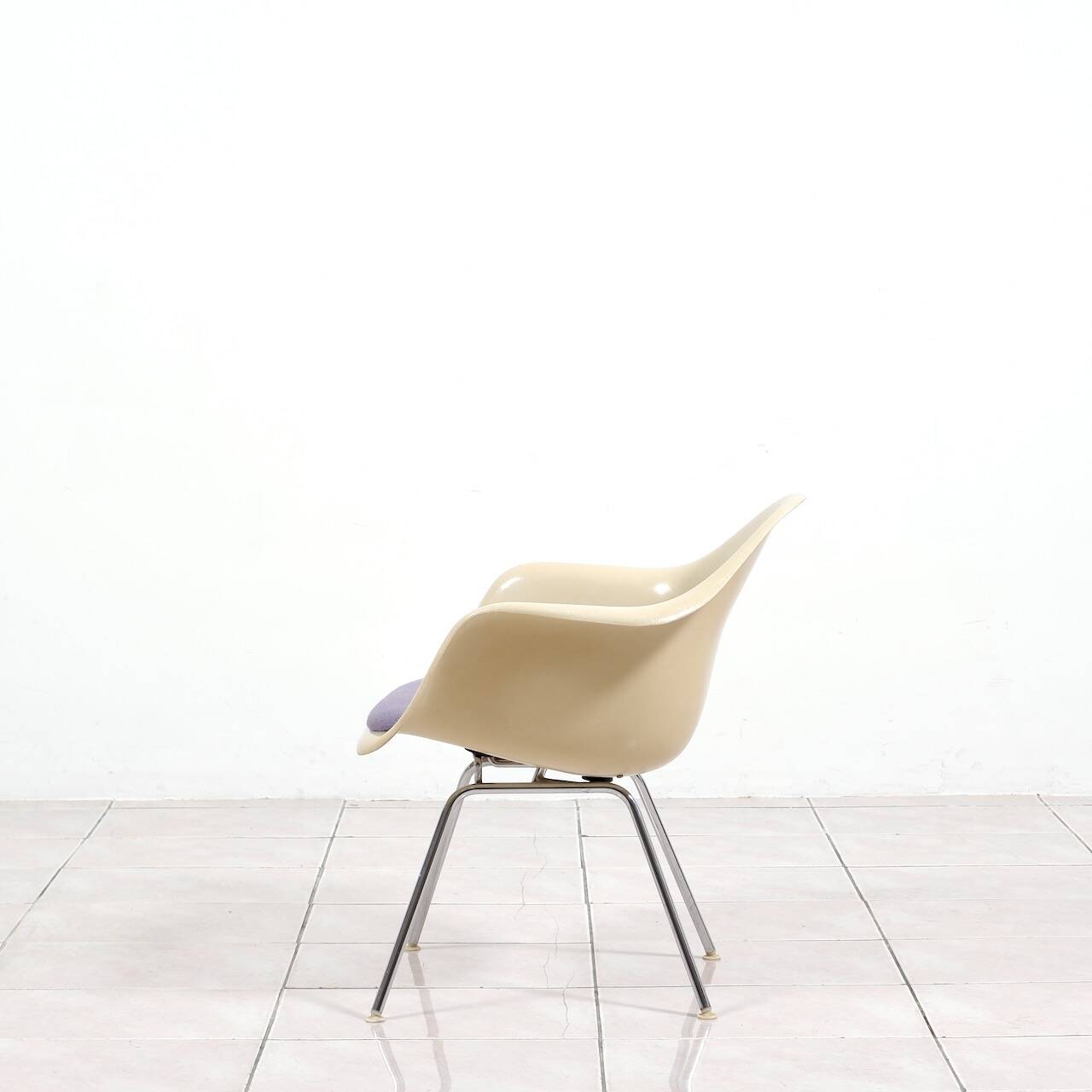 4 Eames DAX fiberglass lounge chairs with purple upholstery by Herman Mille