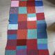 Plaid en patchwork tricoté main