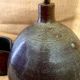 Pied de lampe en céramique et câble en tissu tressé