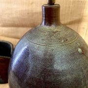Pied de lampe en céramique et câble en tissu tressé