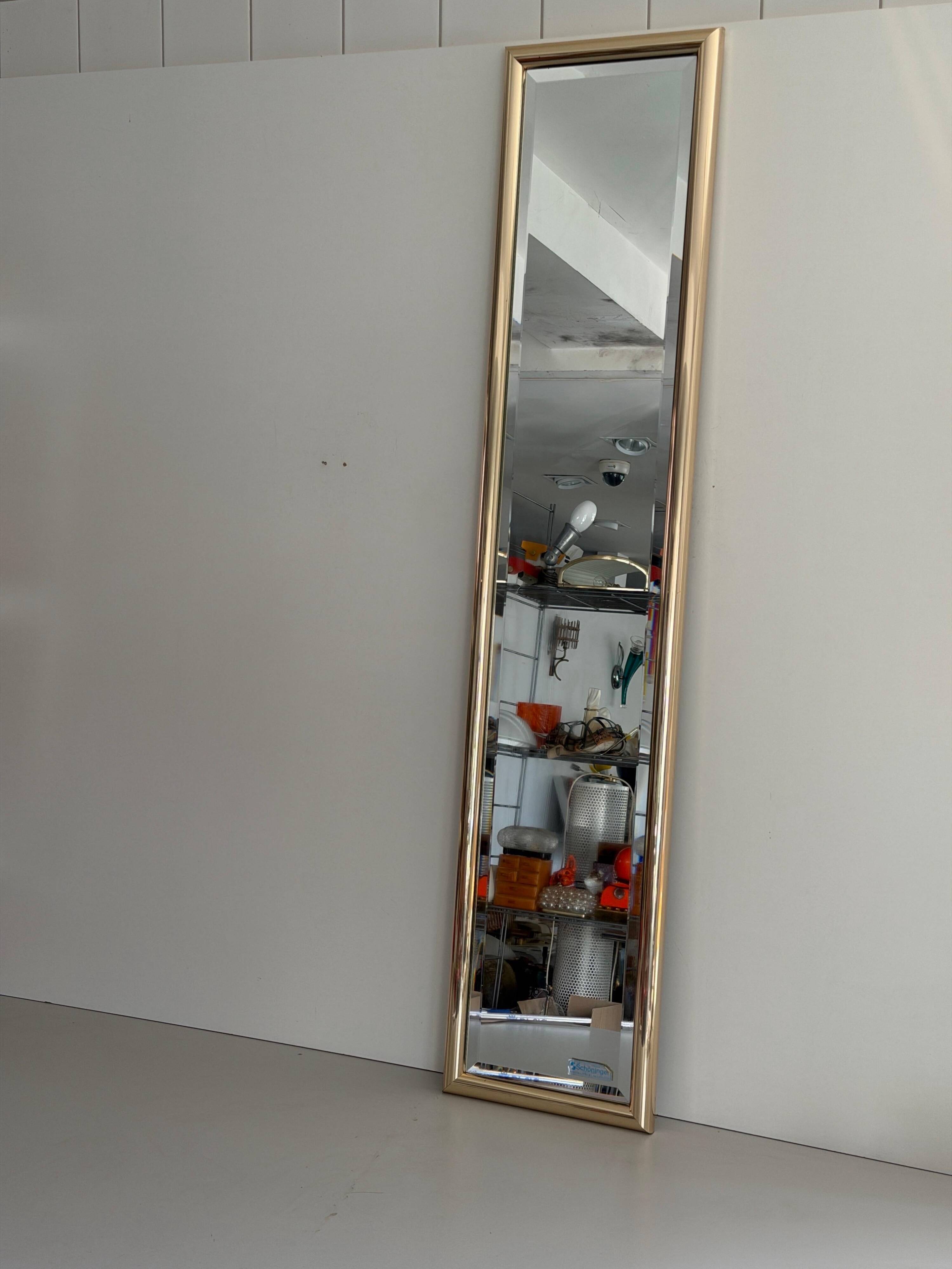 Rectangular wall mirror with a gold metal frame by Schöninger, 1970s, Germany.