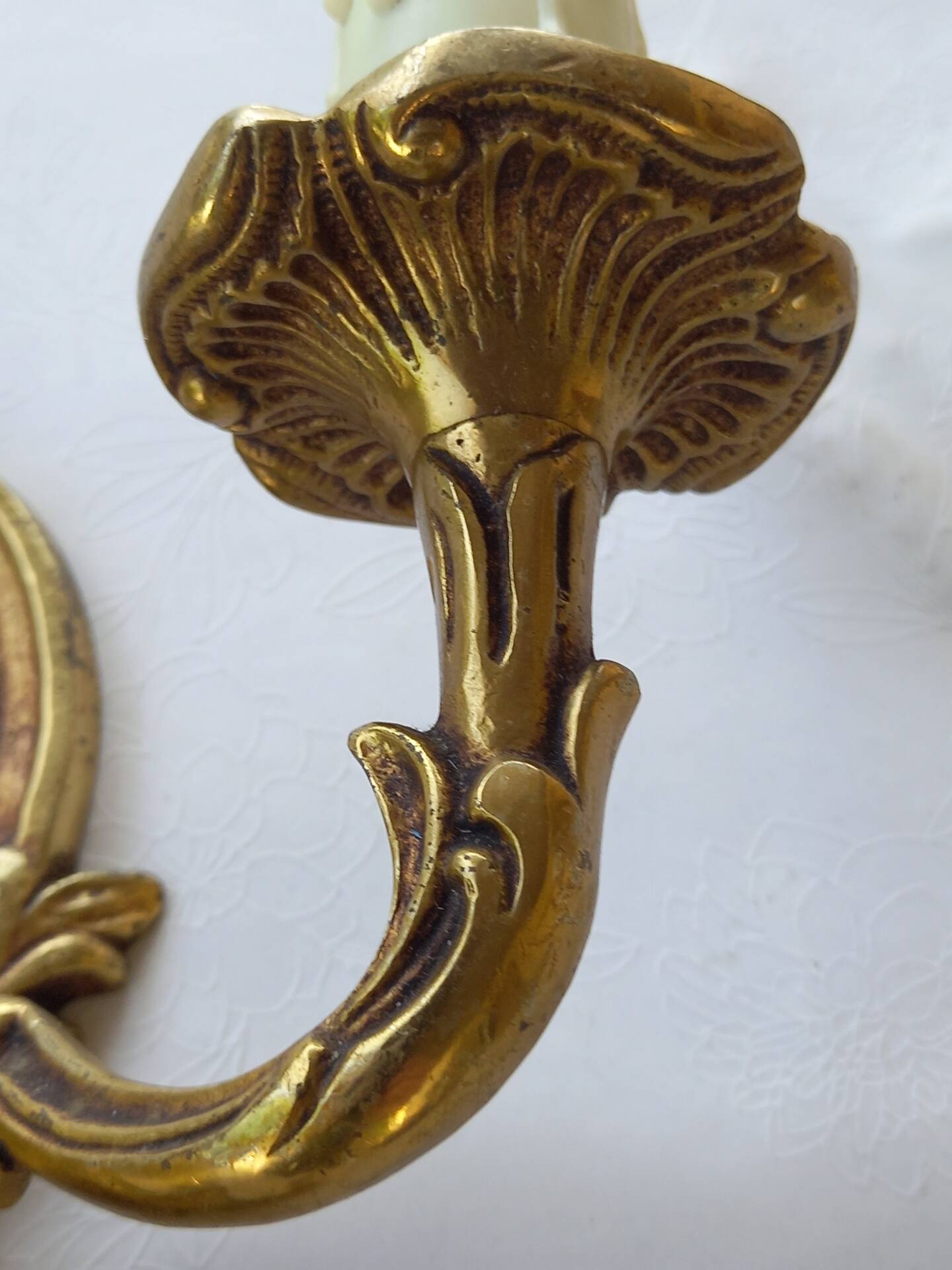 Old pairs of bronze wall sconces