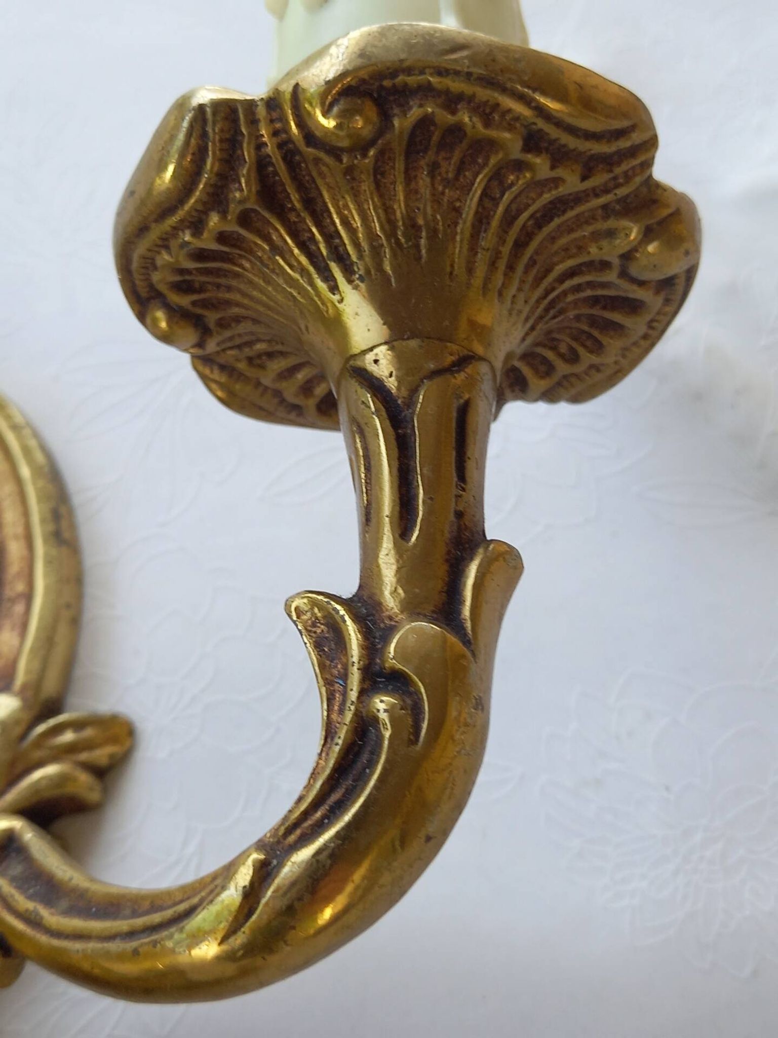 Old pairs of bronze wall sconces