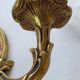Old pairs of bronze wall sconces