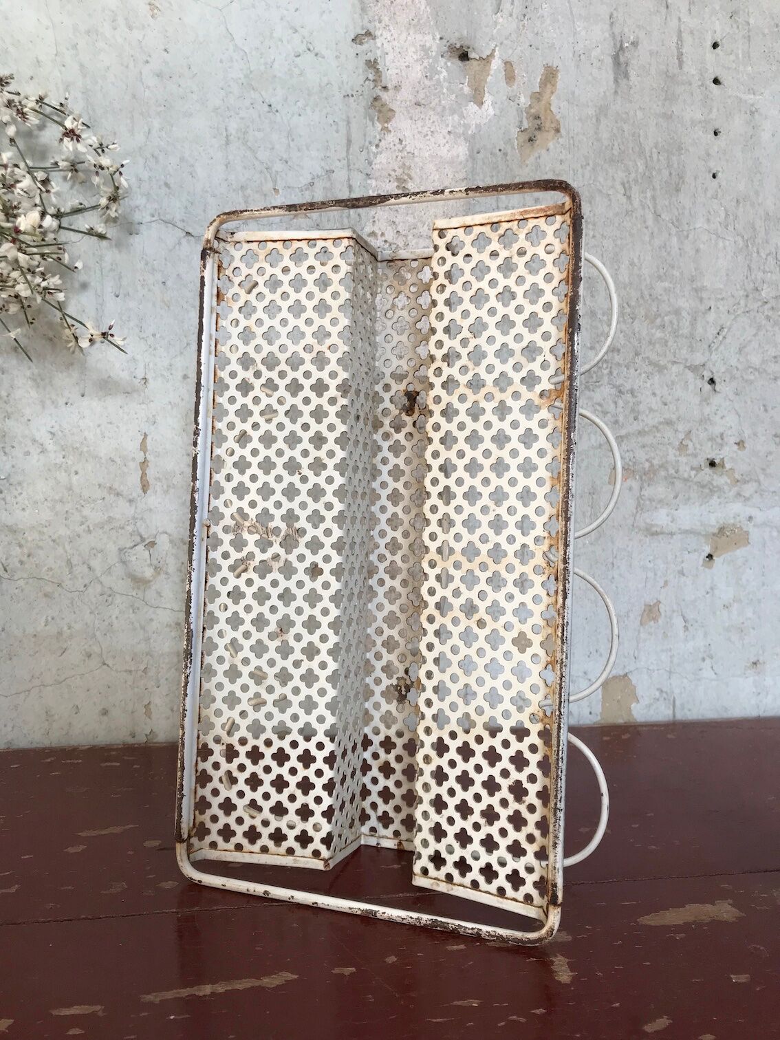 Perforated metal glass basket