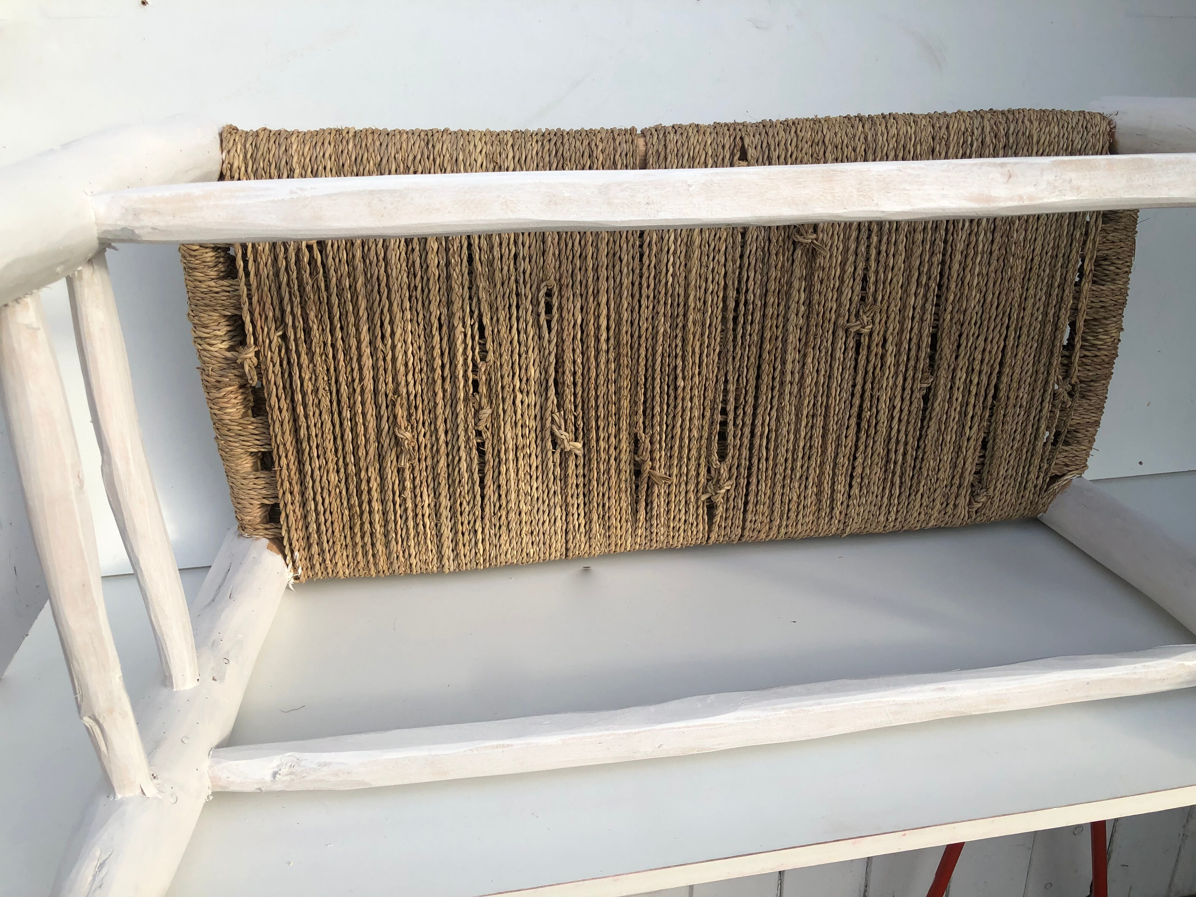 Wooden bench and rope