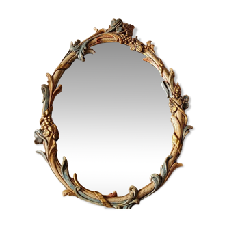 Mirror and its carved wooden sconces