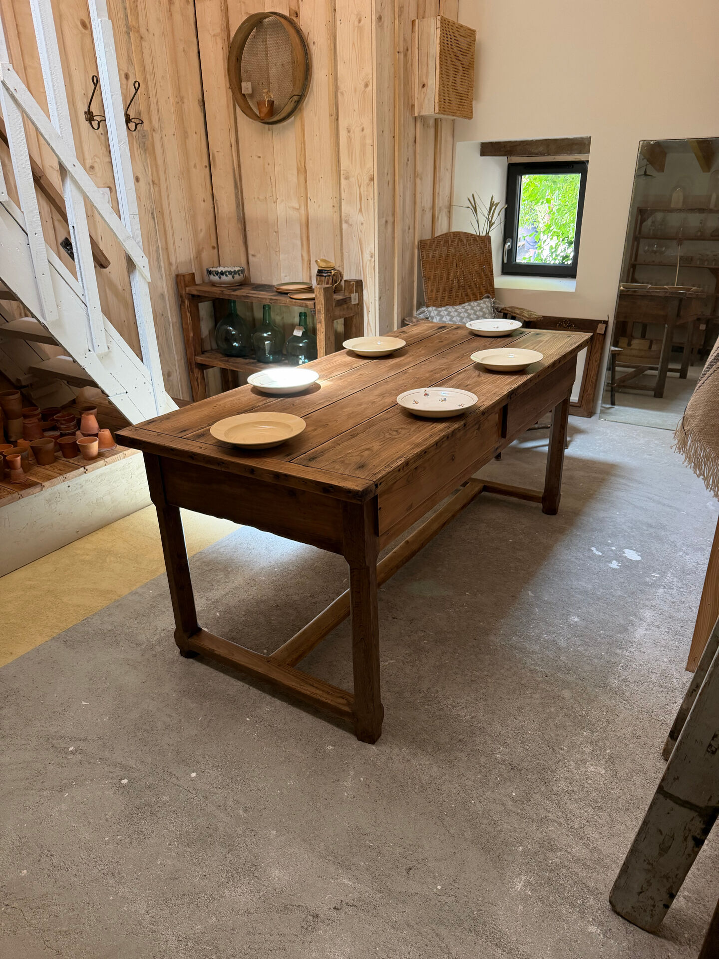 Renovated raw wood farmhouse table