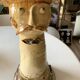 Terracotta plant holder head shape