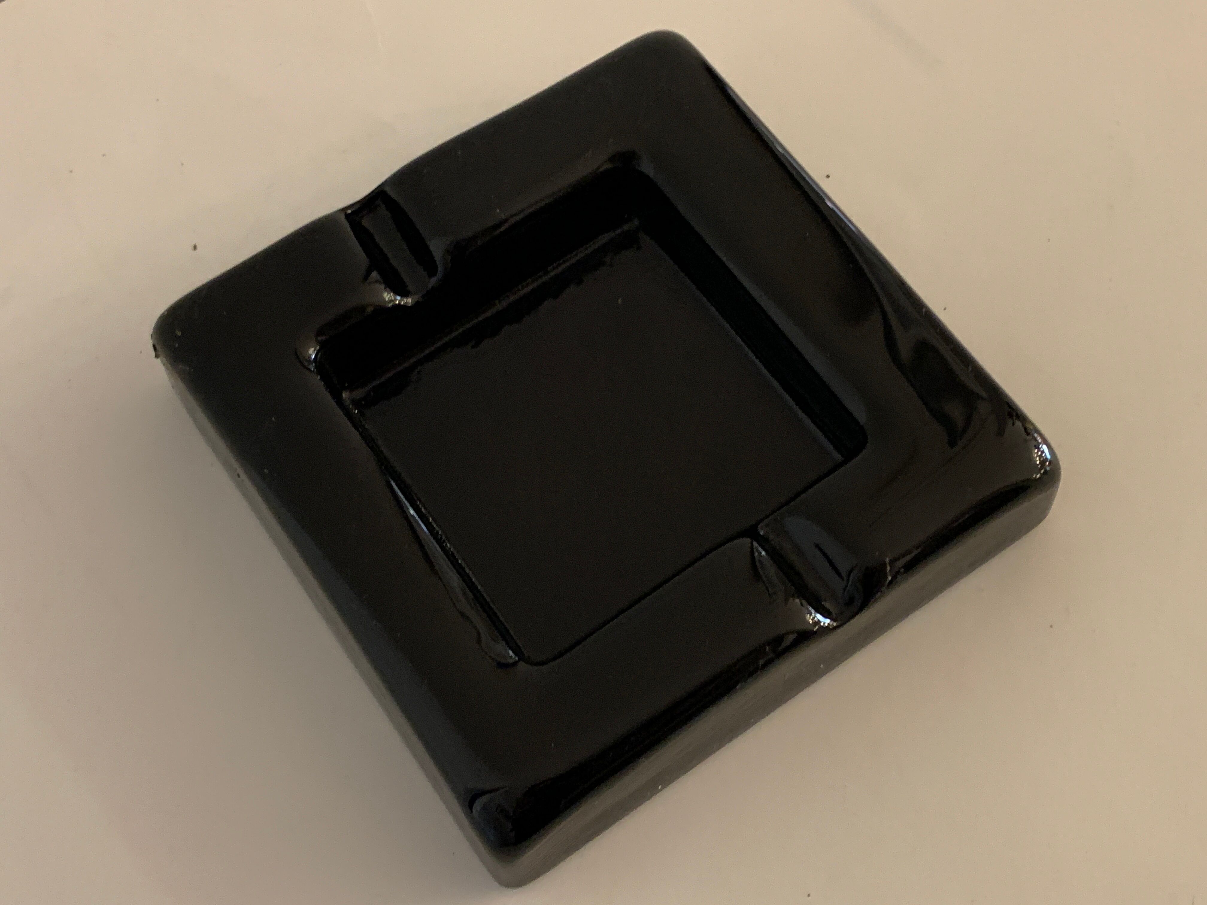 Black glass ashtray