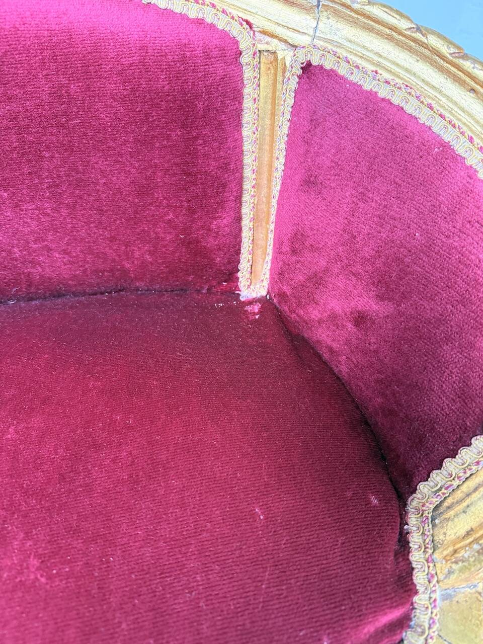 Louis XVI gilt wood and red velvet armchair