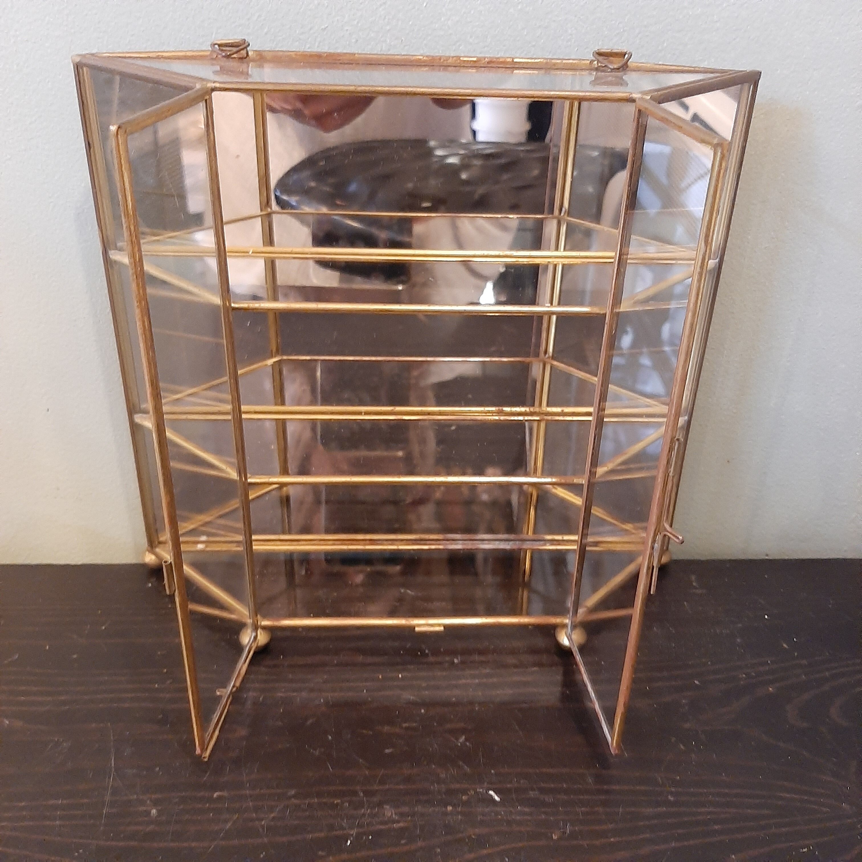 Vitrine miroir en laiton