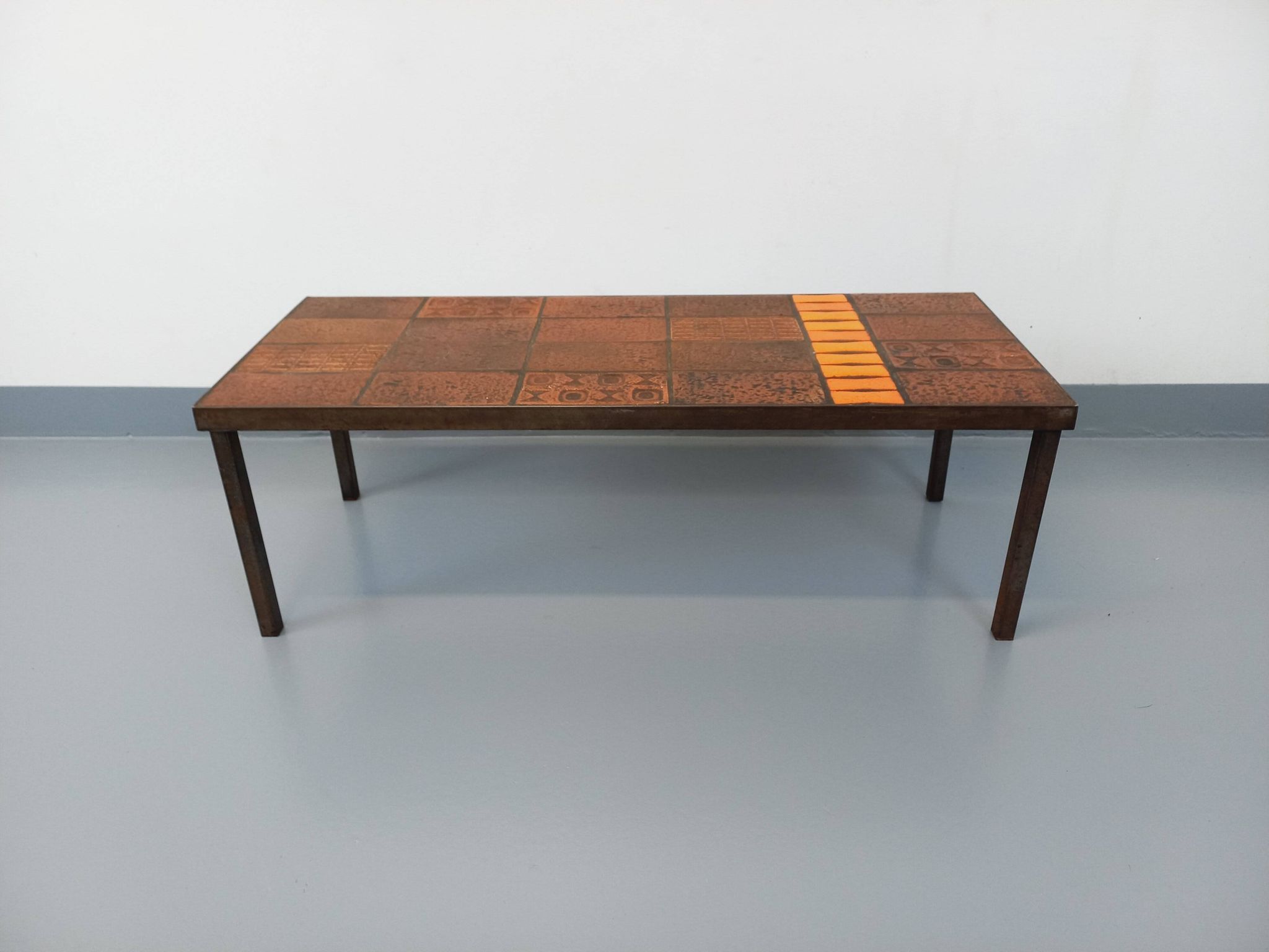 Vintage rectangular coffee table by Jean Jaffeux in steel and ceramic from the 60s