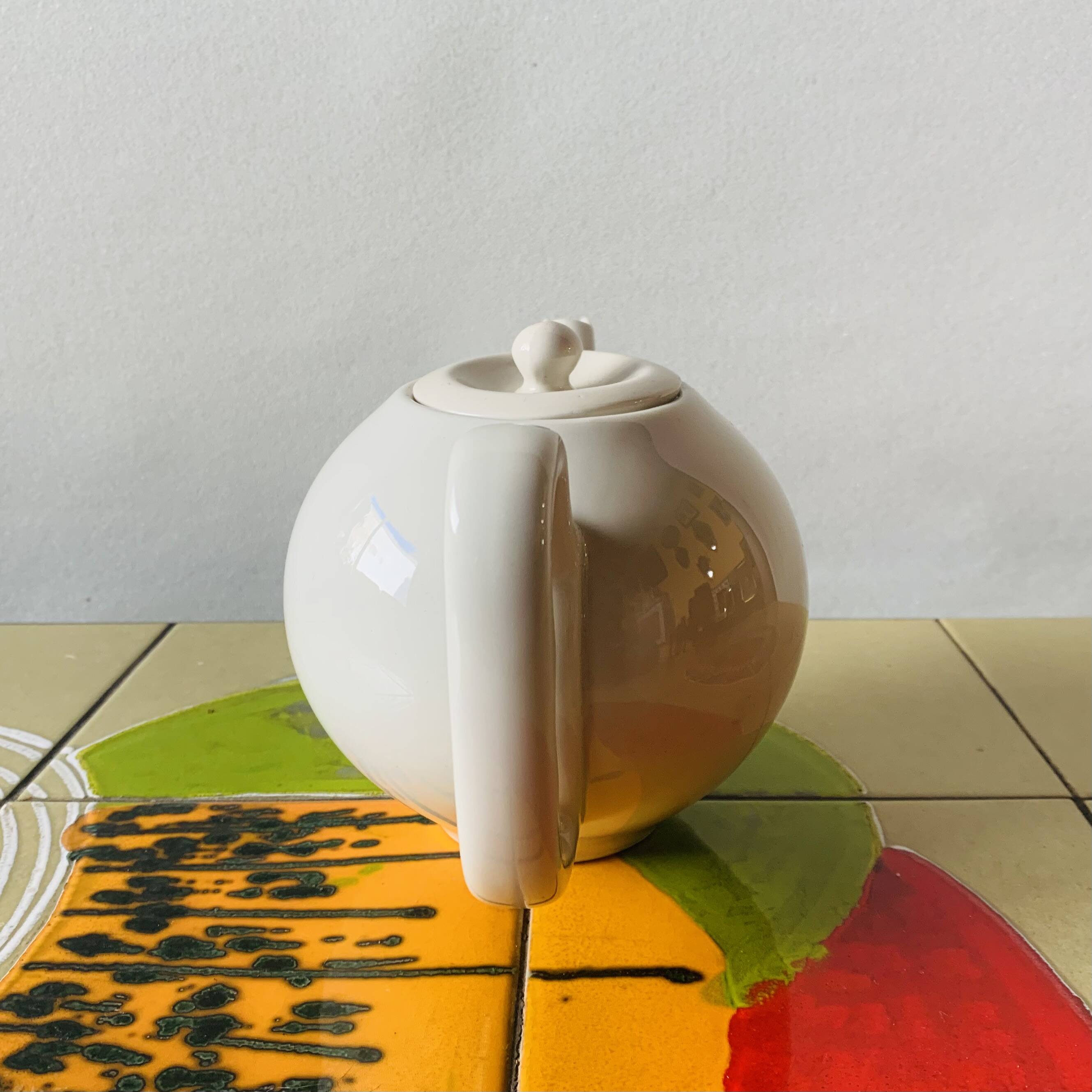 Old insulating teapot in ceramic and chrome metal - Dovo Tiel