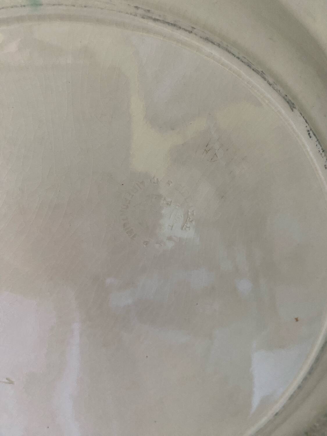 Large round ironstone dish stamped Clairefontaine