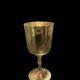 Set of six gold metal glasses