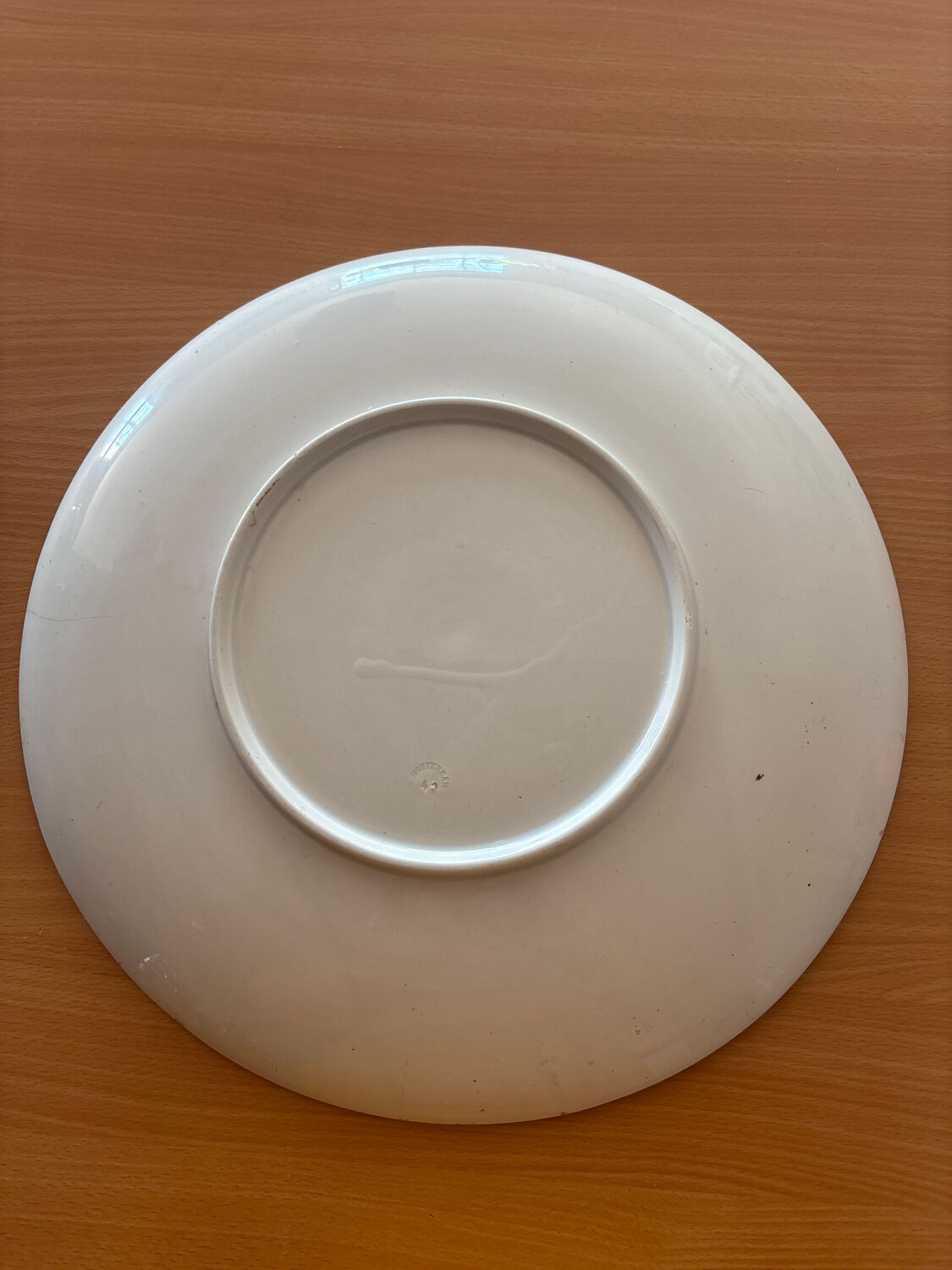 Round plate Montereau painted and signed L Pierson 1887