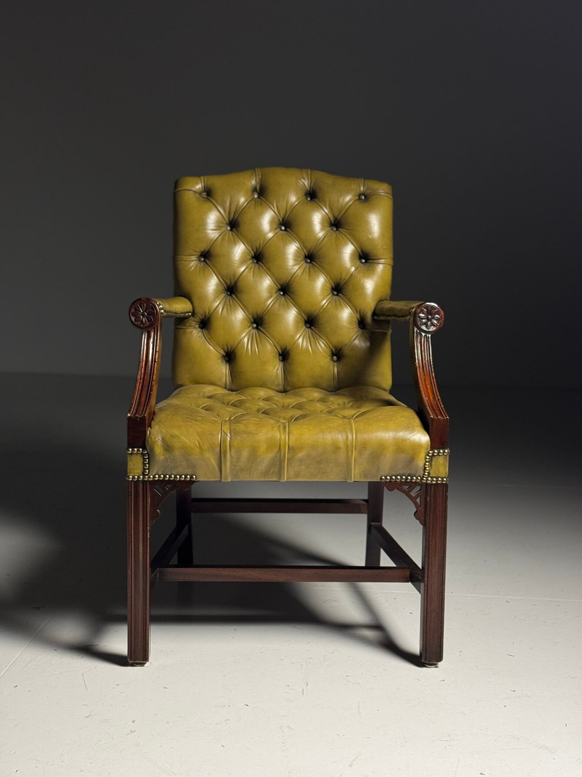 Green leather tufted office chair