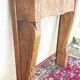 Manteau de cheminée en bois sculpté