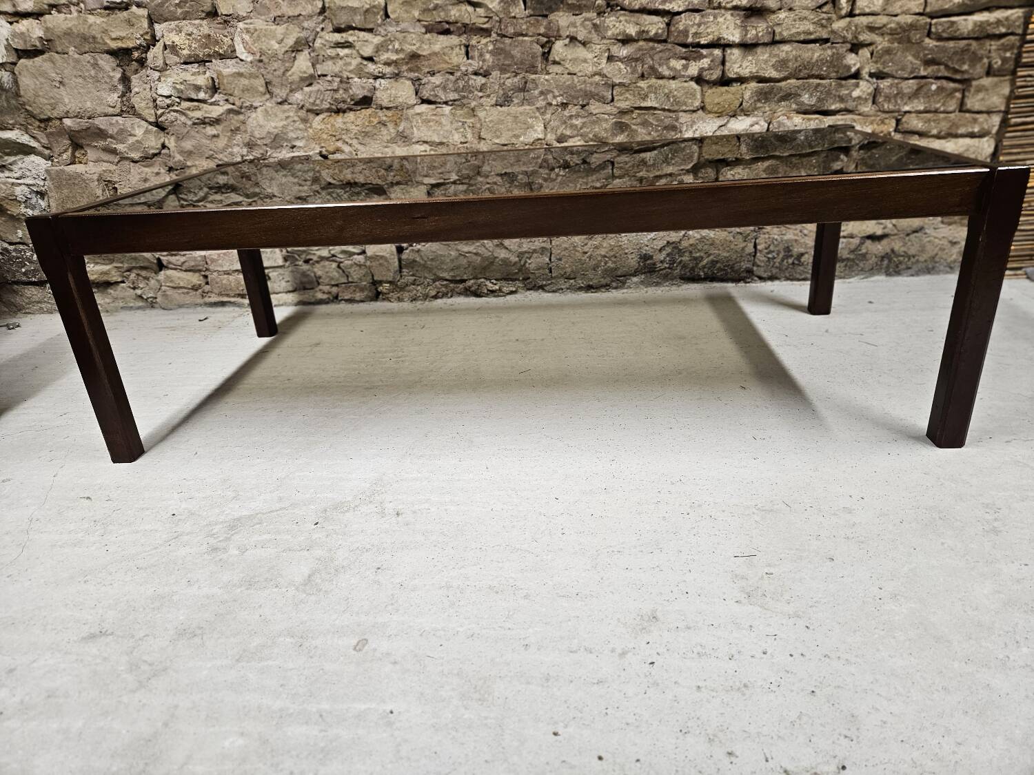 Teak coffee table with smoked glass 1970"