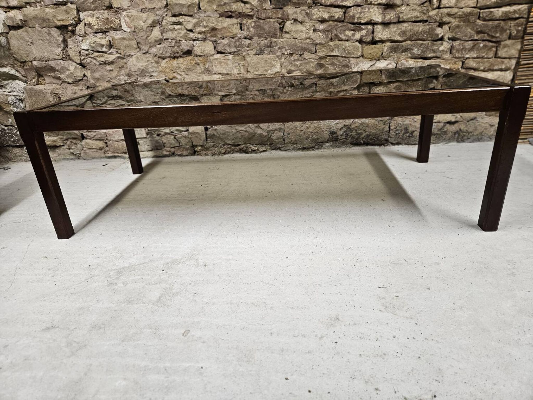 Teak coffee table with smoked glass 1970"