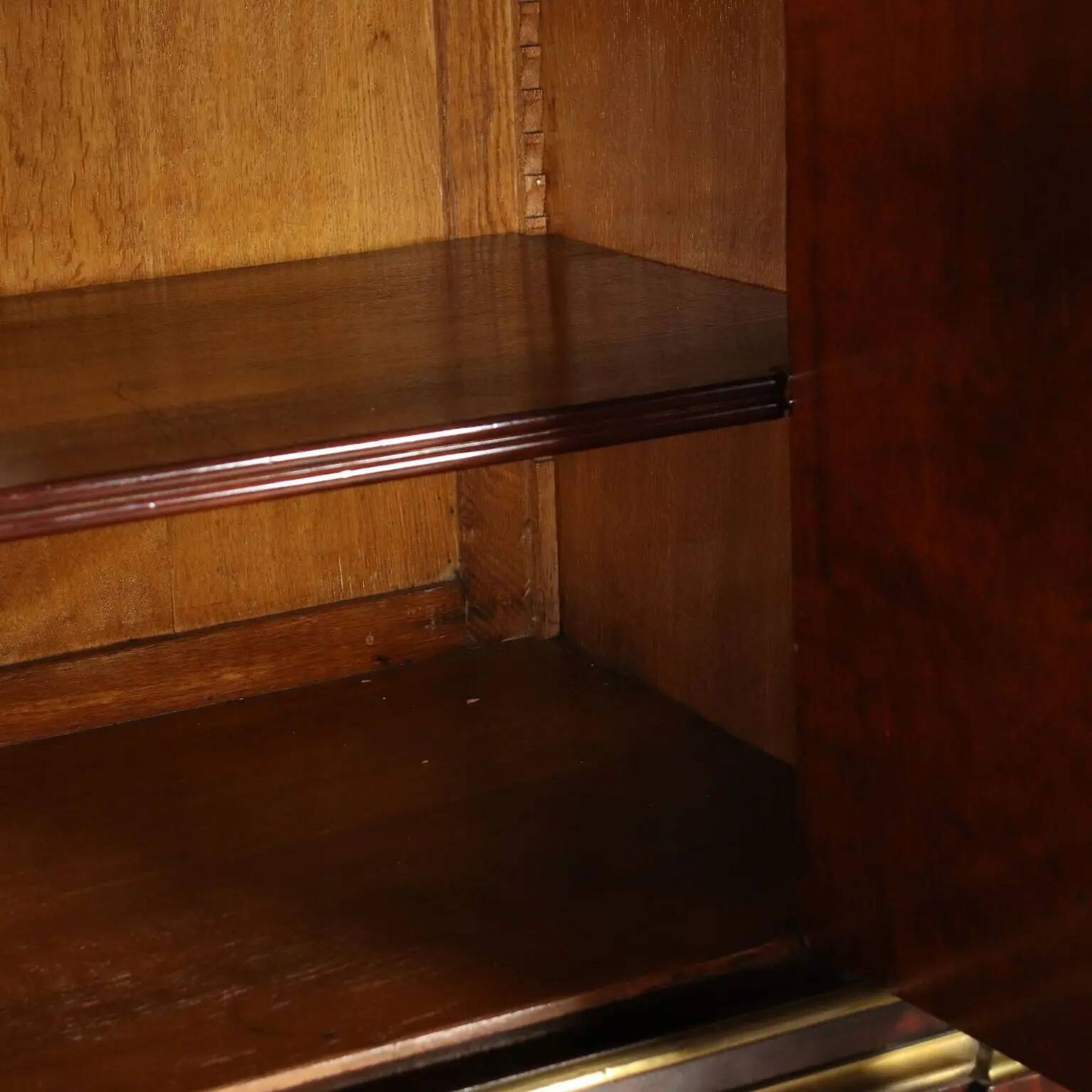 Empire library in mahogany veneer, sessile oak, France, early 19th century.