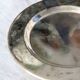 Vintage patinated silver metal bottle coaster – Golden knot