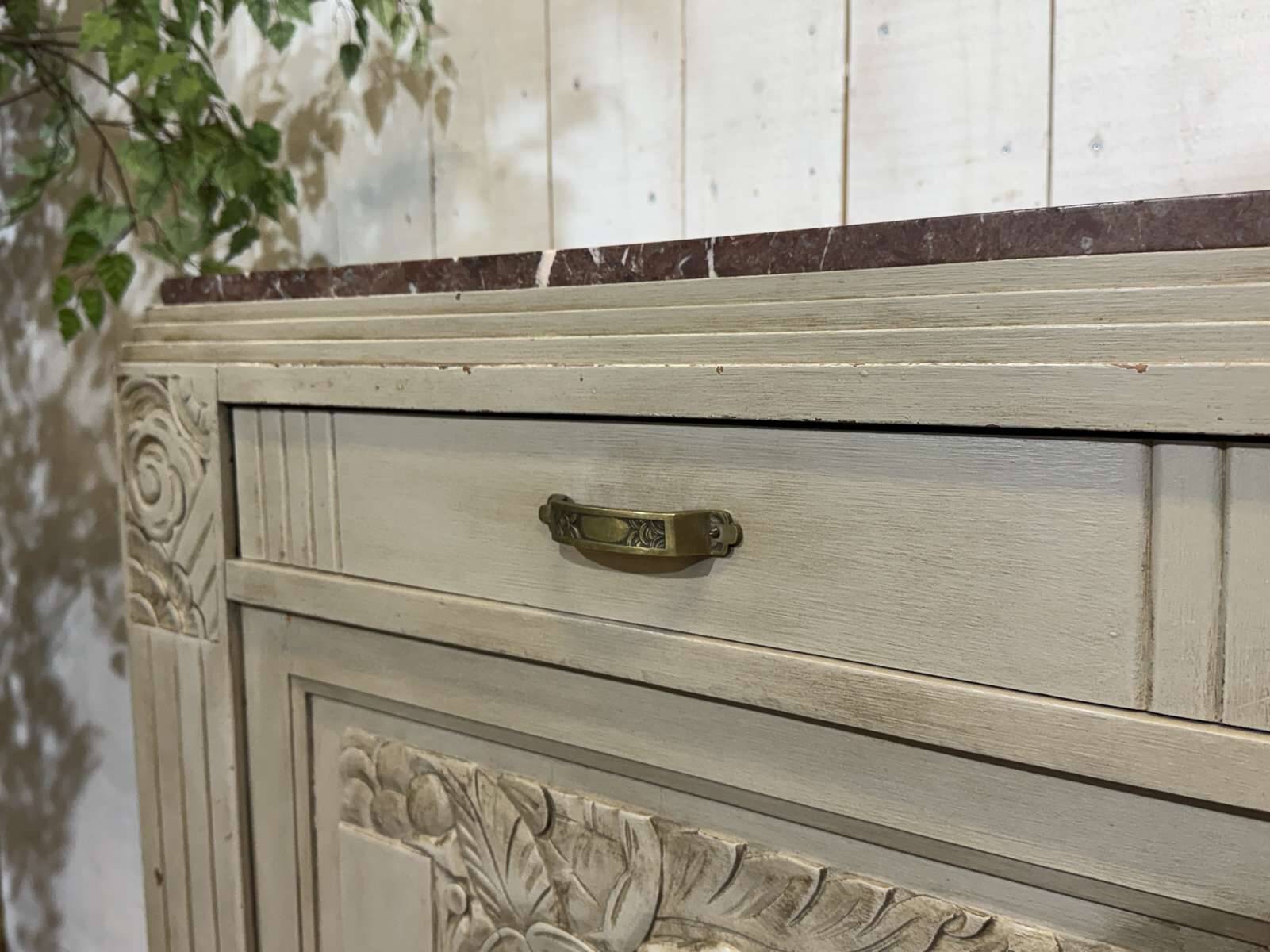 Art Deco sideboard in walnut, oak and marble top.