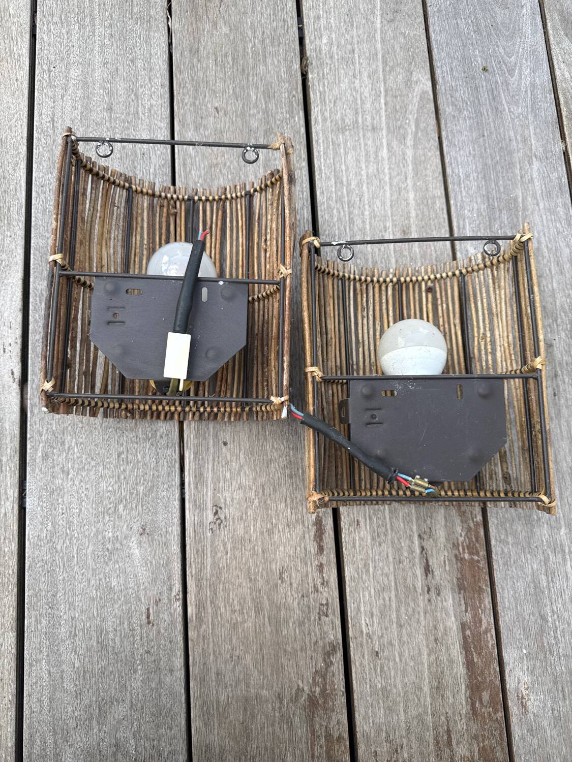 Two rattan wall lights