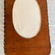 Oval wicker mirror