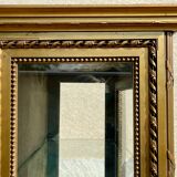 Showcase in gilded wood Louis XVI style