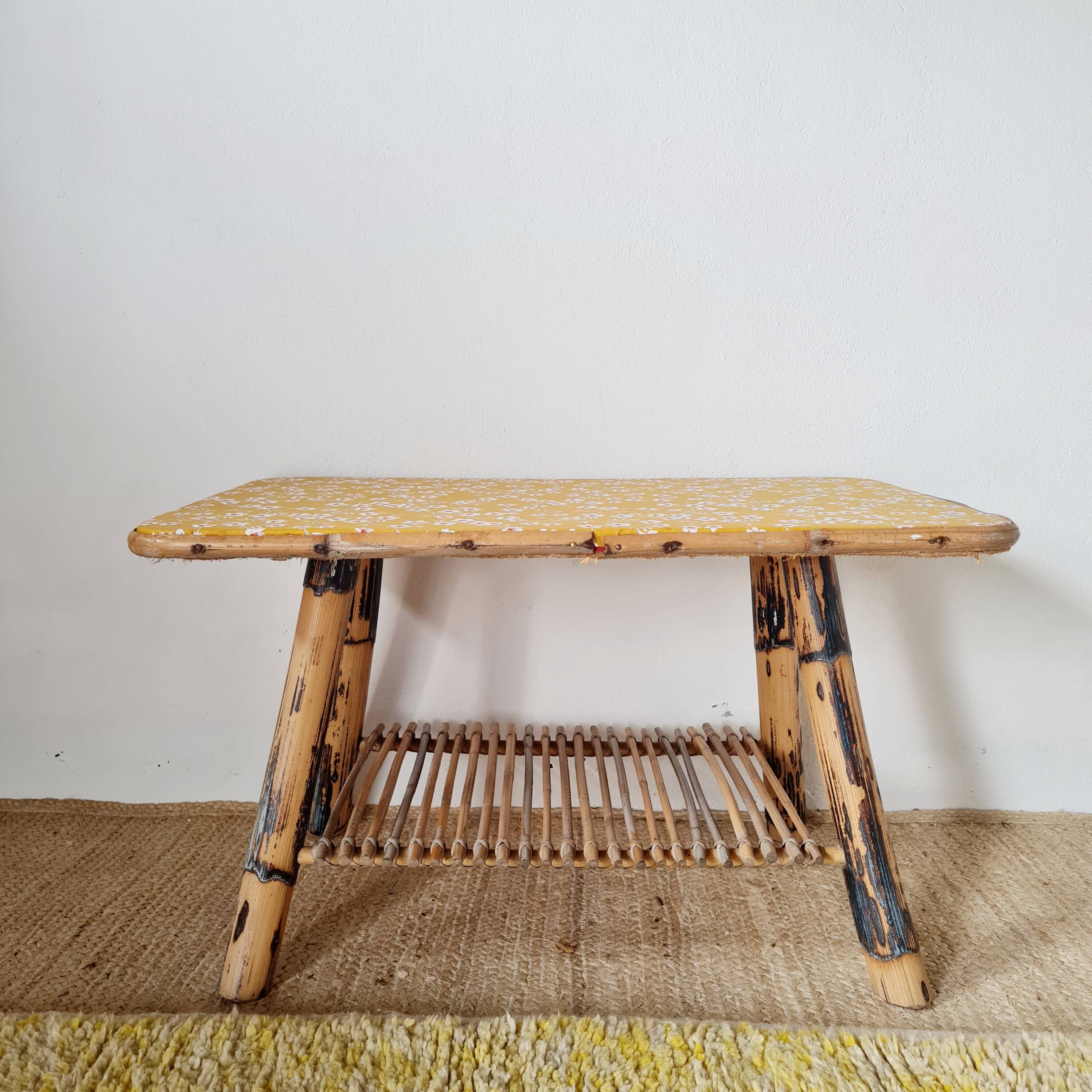 Antique rattan coffee table - yellow floral top