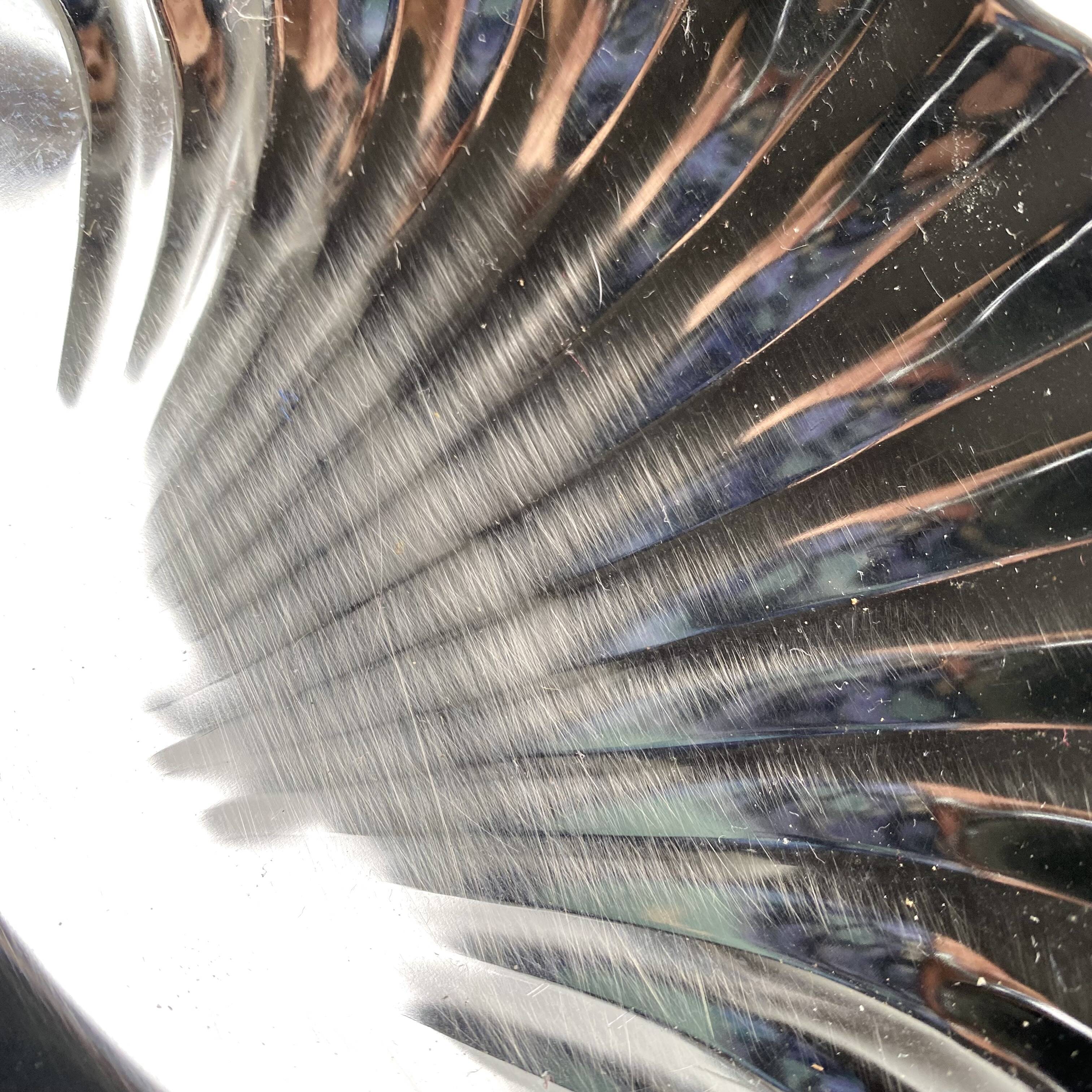 Stainless steel serving platter in the shape of seashells