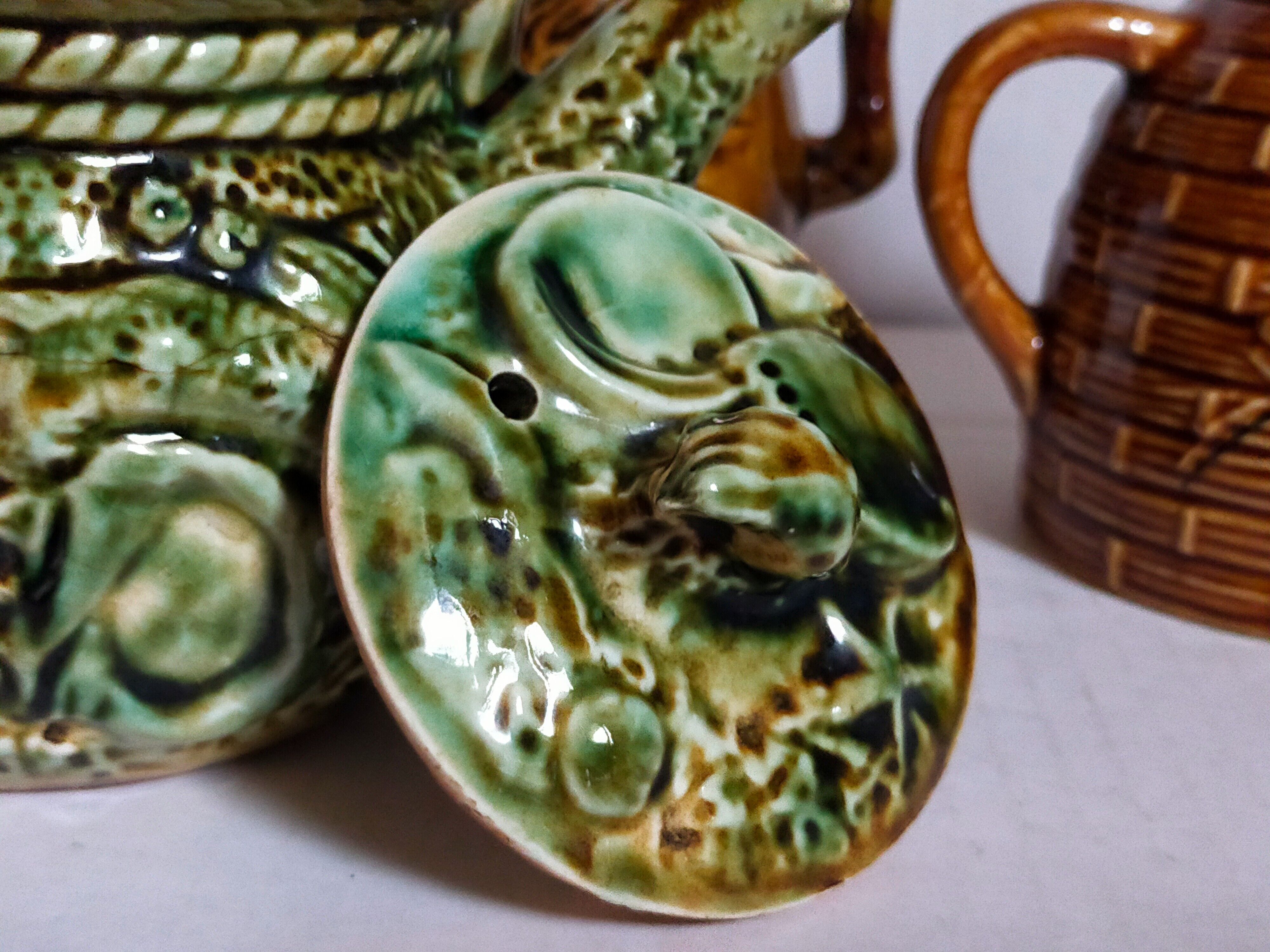 Set of old teapots and honey pot