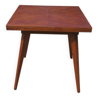 Table extensible à pieds compas