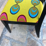 Pair of chairs upholstered with wax fabric