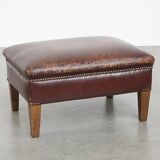 Ottoman vintage en cuir de mouton