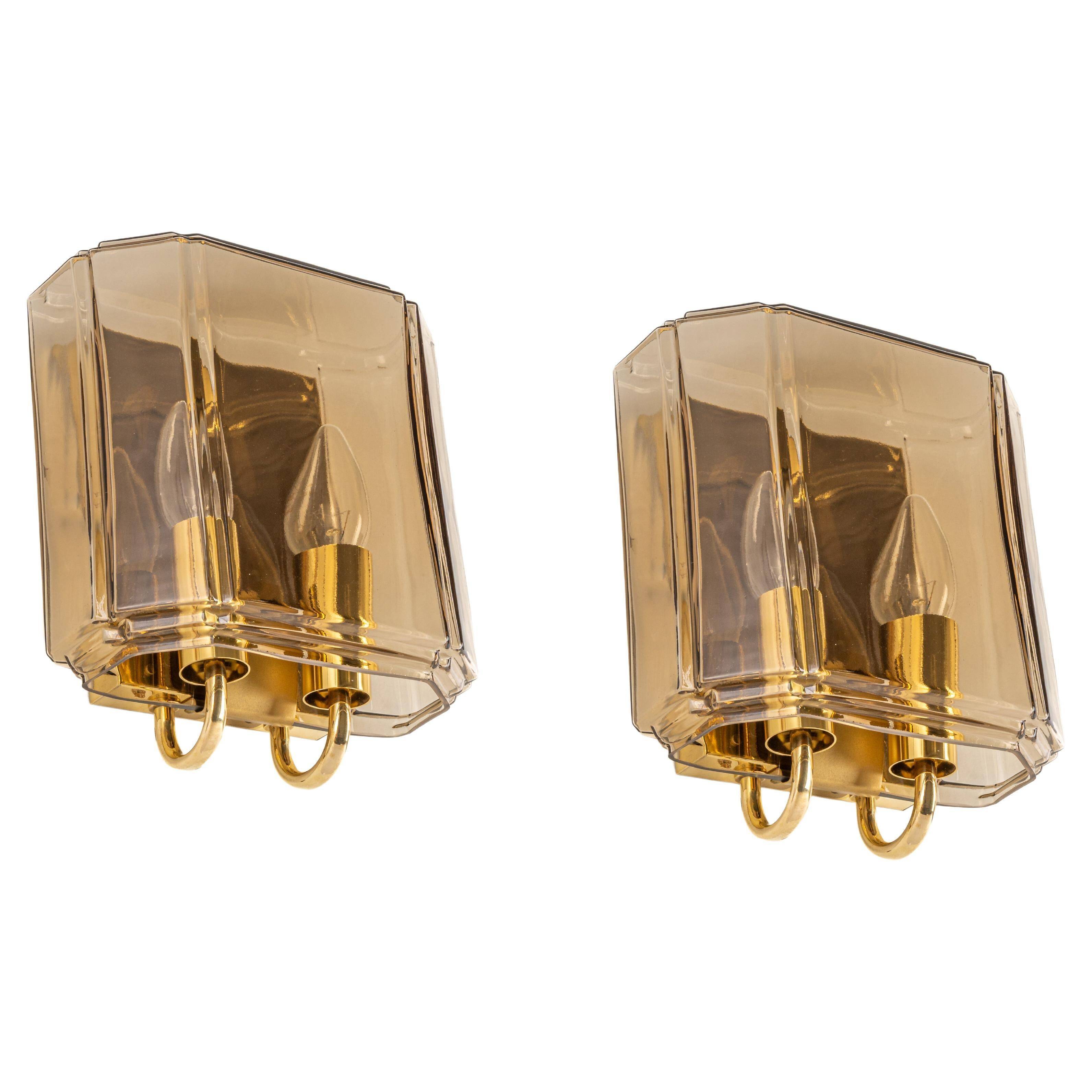Large smoked glass wall sconces by Limburg, Germany.