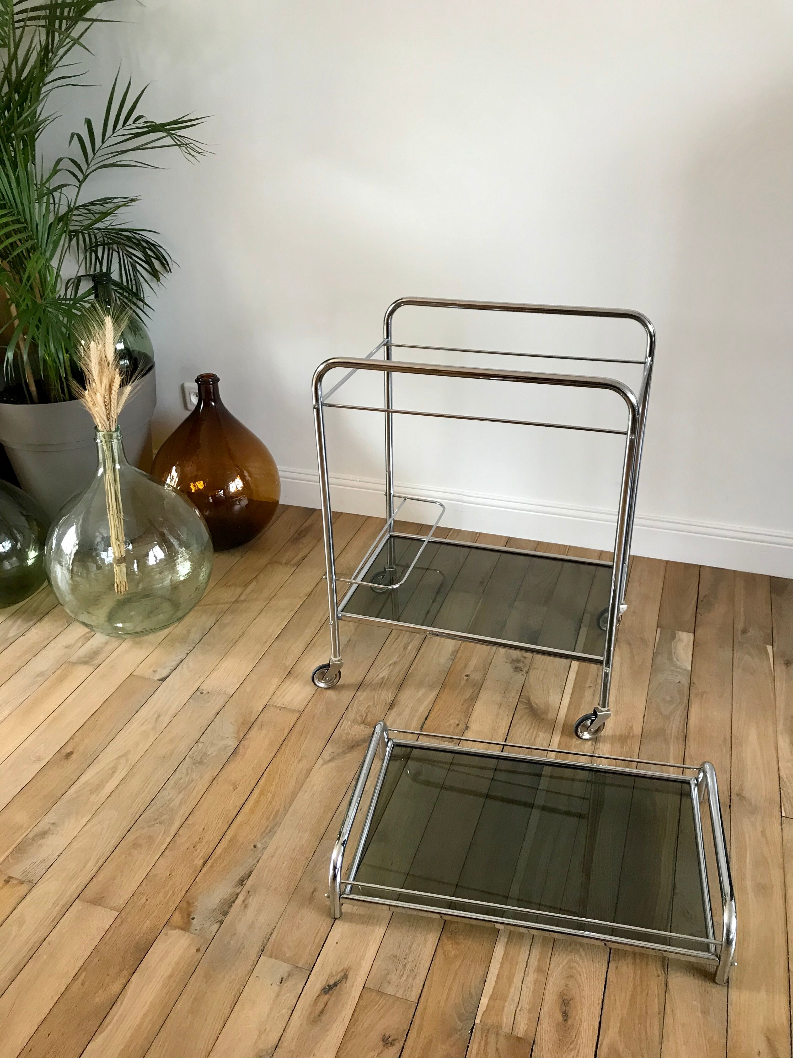 Serving in chrome steel and smoked glass 70s