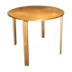 Round dining table in vintage wood