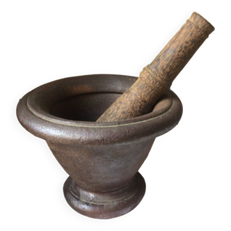 Cast iron mortar and wooden pestle