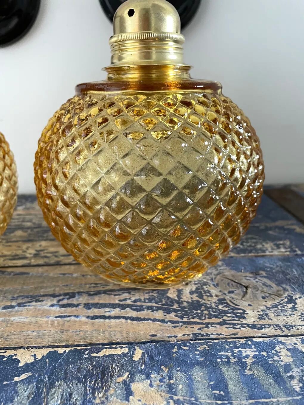 Pair of vintage sconces in electrified golden glass to nine