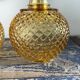 Pair of vintage sconces in electrified golden glass to nine