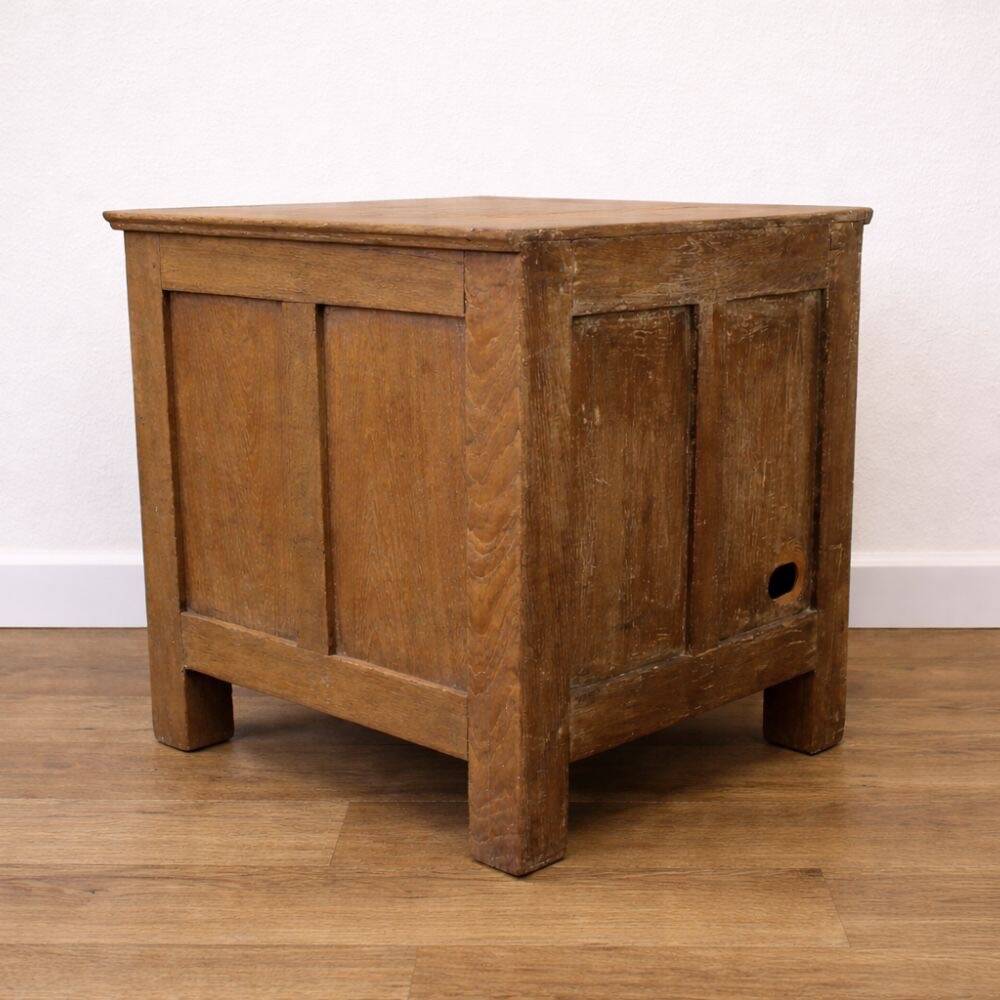 Oak side cabinet with carved motifs